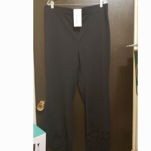 Women black pants with beautiful swirl hole detail at the bottom